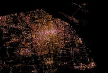 持続可能な開発のビッグデータ国際研究センターはこのほど、世界初の都市夜間照明リモートセンシング画像集「SDGSAT-1衛星微光画像集」を発表した。写真は上海の微光画像。