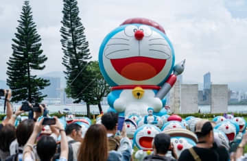 香港のセントラルの公園で25日、週末フラッシュモブ展が行われた。