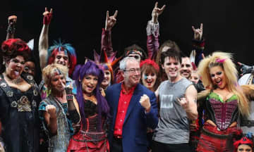 Ben Elton and the 'We Will Rock You' cast - Photo: Don Arnold/WireImage